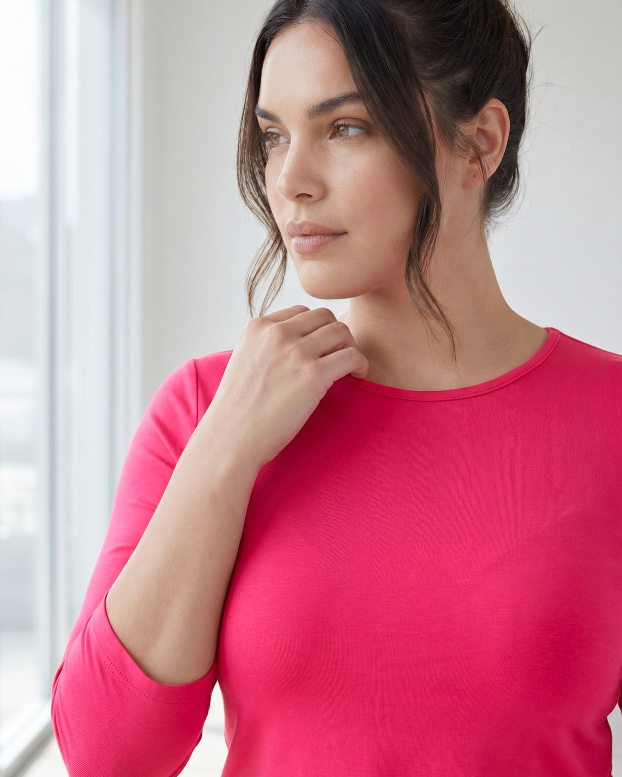 Model wearing Nuggles® 3/4 Essential Tee in Hot Pink