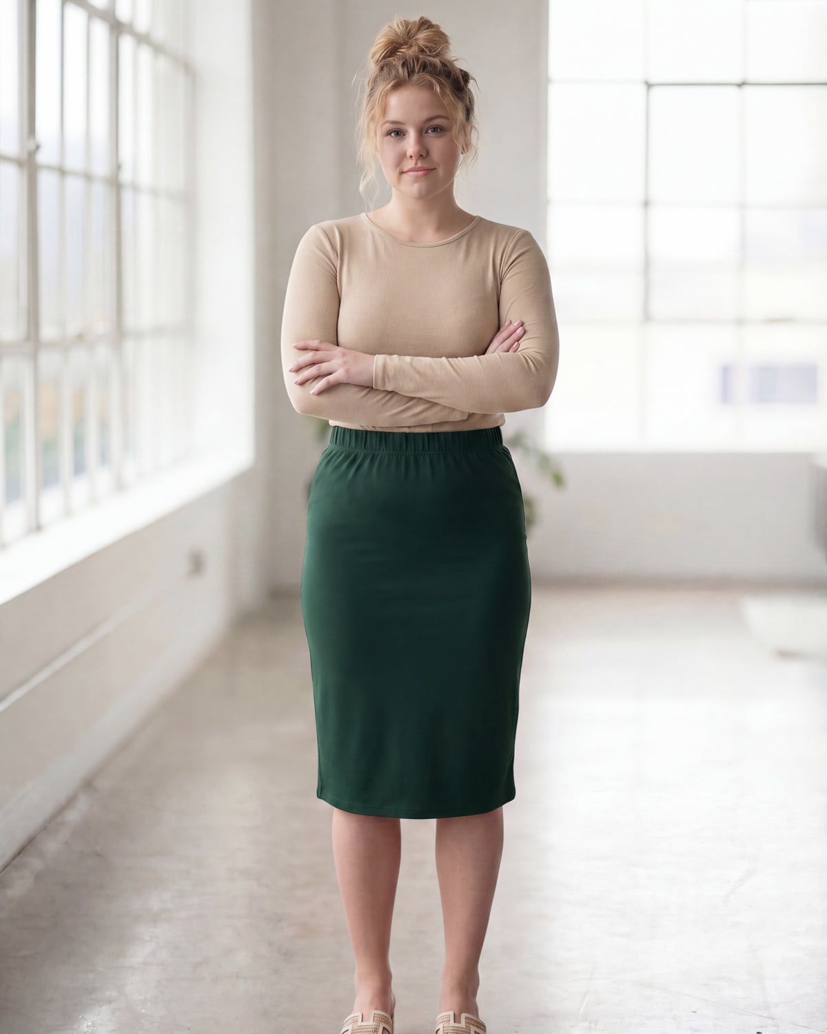 Model wearing Nuggles® 27" Classic Skirt in Hunter Green