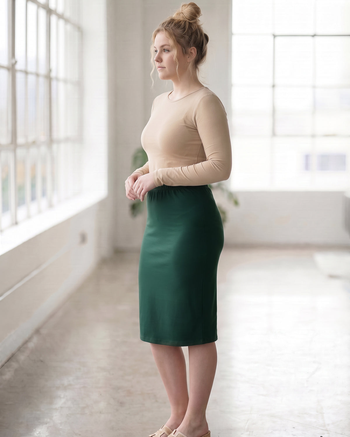 Model wearing Nuggles® 27" Classic Skirt in Hunter Green