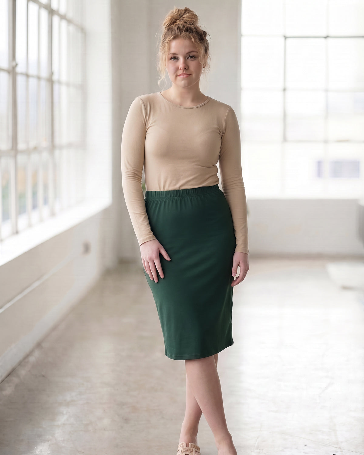 Model wearing Nuggles® 27" Classic Skirt in Hunter Green