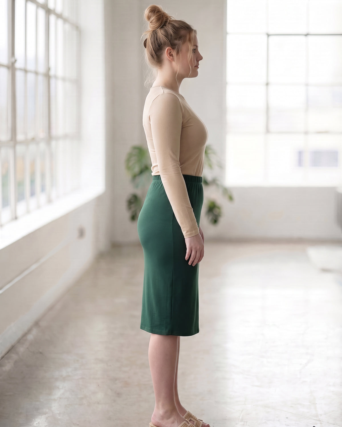 Model wearing Nuggles® 27" Classic Skirt in Hunter Green
