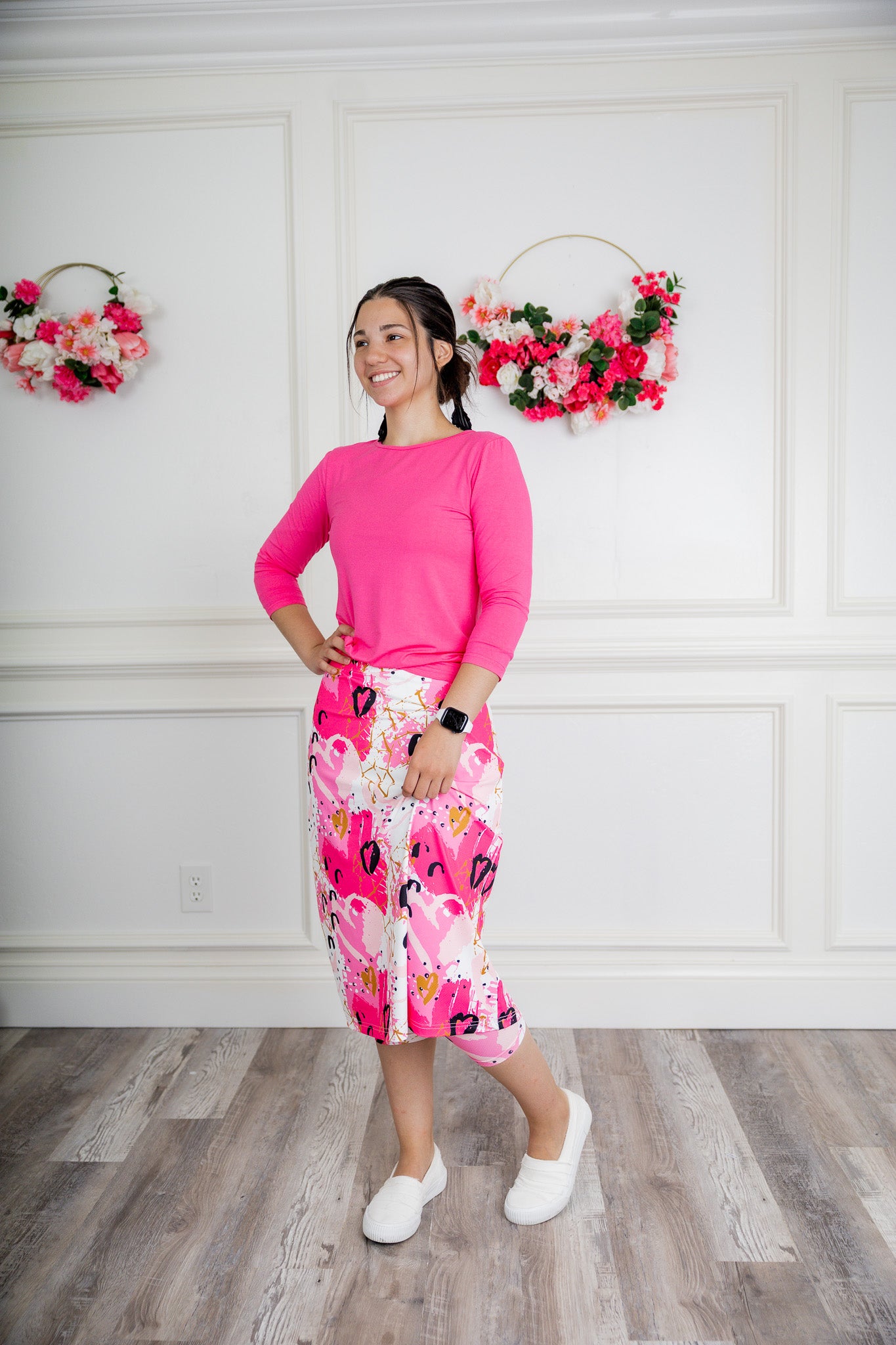 Woman wearing 27-inch tropical flower modest sport skirt with built-in leggings—ideal for activewear, cycling, running, swimming, and workouts.