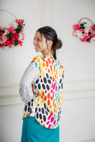 Modest women's long sleeve knit top with contrasting prints, sleeve cuffs, styled for casual or dressy wear by Nuggles®.