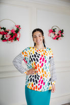 Modest women's long sleeve knit top with contrasting prints, sleeve cuffs, styled for casual or dressy wear by Nuggles®.