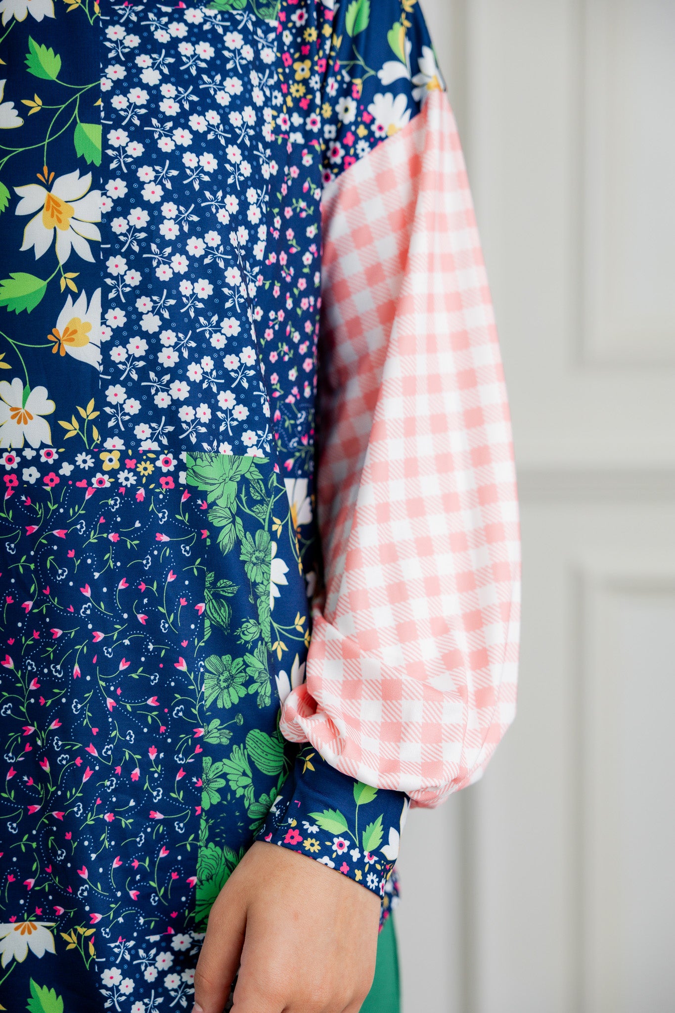 Modest women's long sleeve knit top with contrasting prints, sleeve cuffs, styled for casual or dressy wear by Nuggles®.