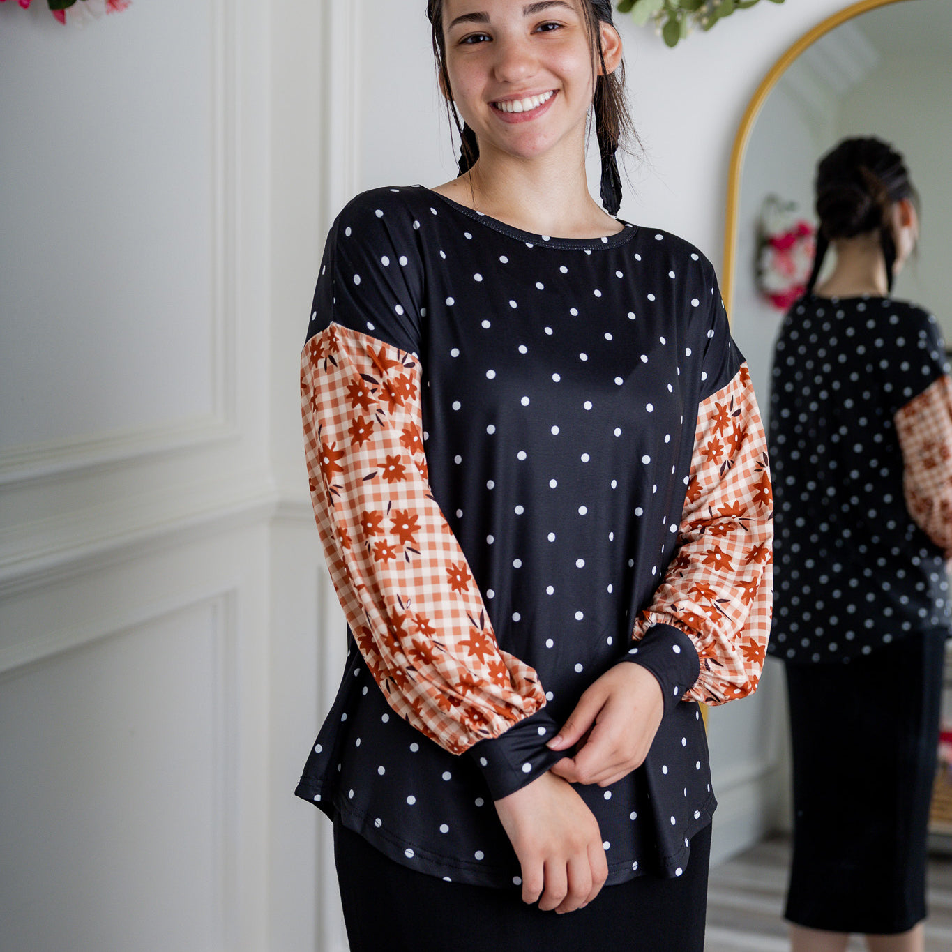 Modest women's long sleeve knit top with contrasting prints, sleeve cuffs, styled for casual or dressy wear by Nuggles®.