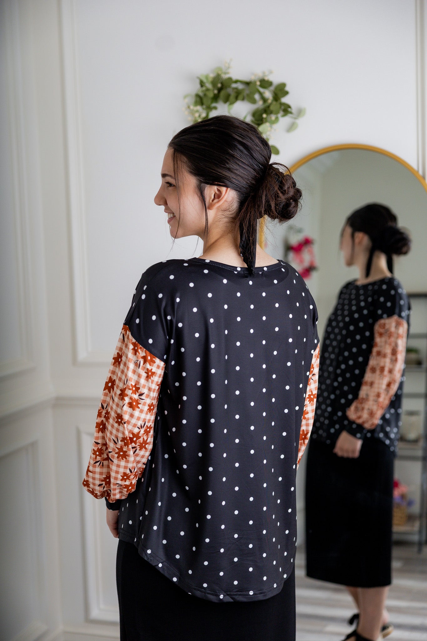 Modest women's long sleeve knit top with contrasting prints, sleeve cuffs, styled for casual or dressy wear by Nuggles®.