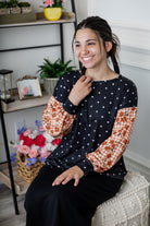 Modest women's long sleeve knit top with contrasting prints, sleeve cuffs, styled for casual or dressy wear by Nuggles®.