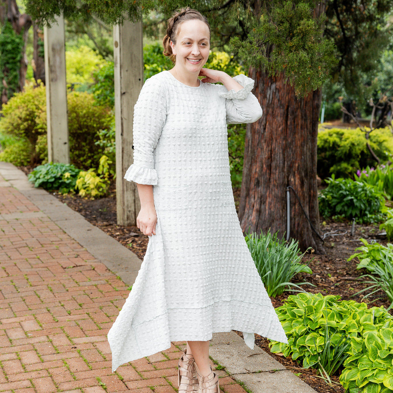 Mommy and Me matching dresses – Model in textured Daphne Dress.