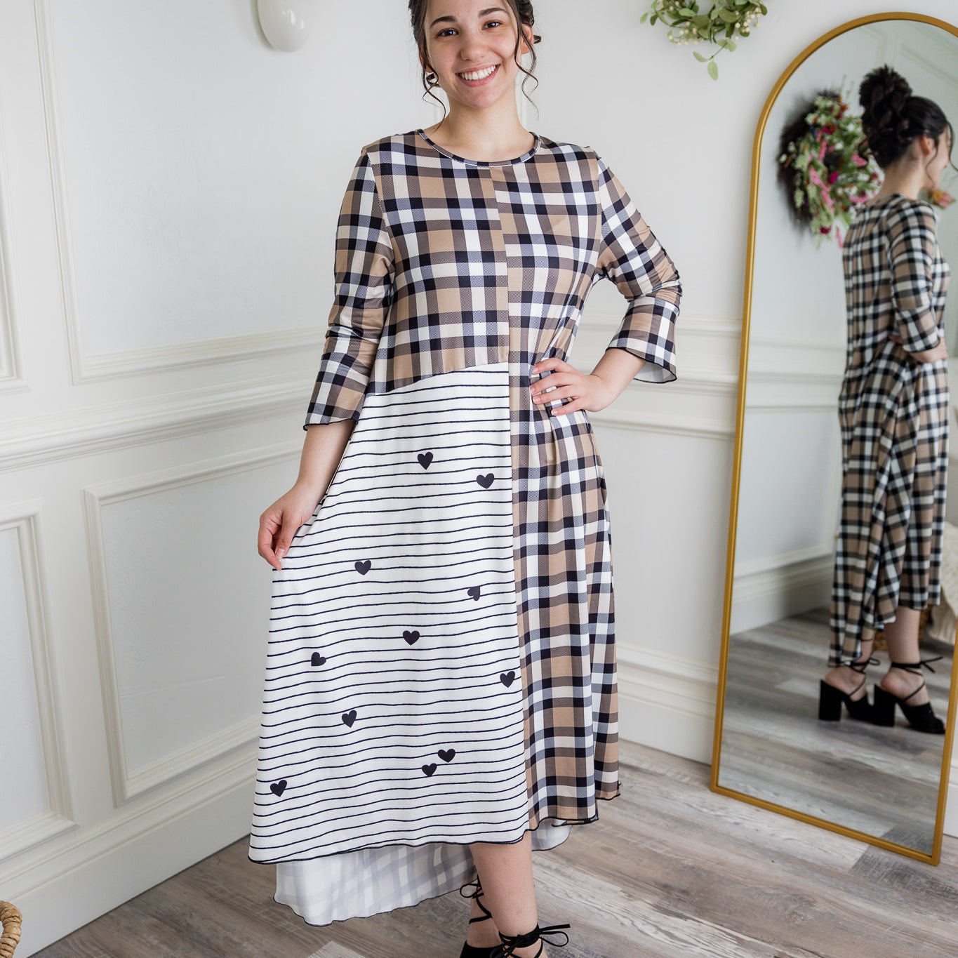 Modest high low knit dress with asymmetrical hem, ruffle sleeves, and mixed front prints – Kristine Dress by Nuggles®