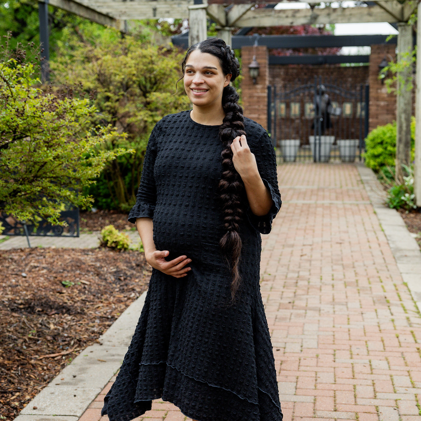 Mommy and Me matching dresses – Model in textured Daphne Dress.