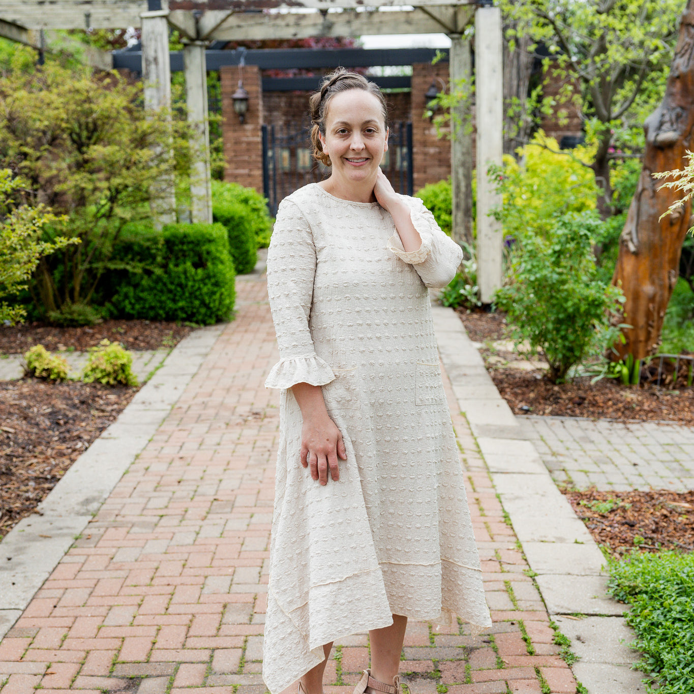 Mommy and Me matching dresses – Model in textured Daphne Dress.