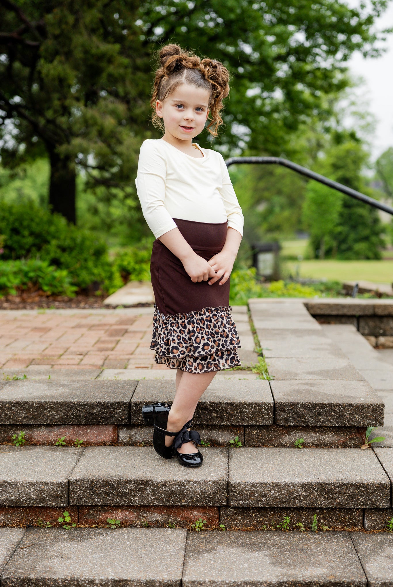 Modest girls’ ruffle slip with wide no-elastic waistband, perfect for layering under dresses and skirts.