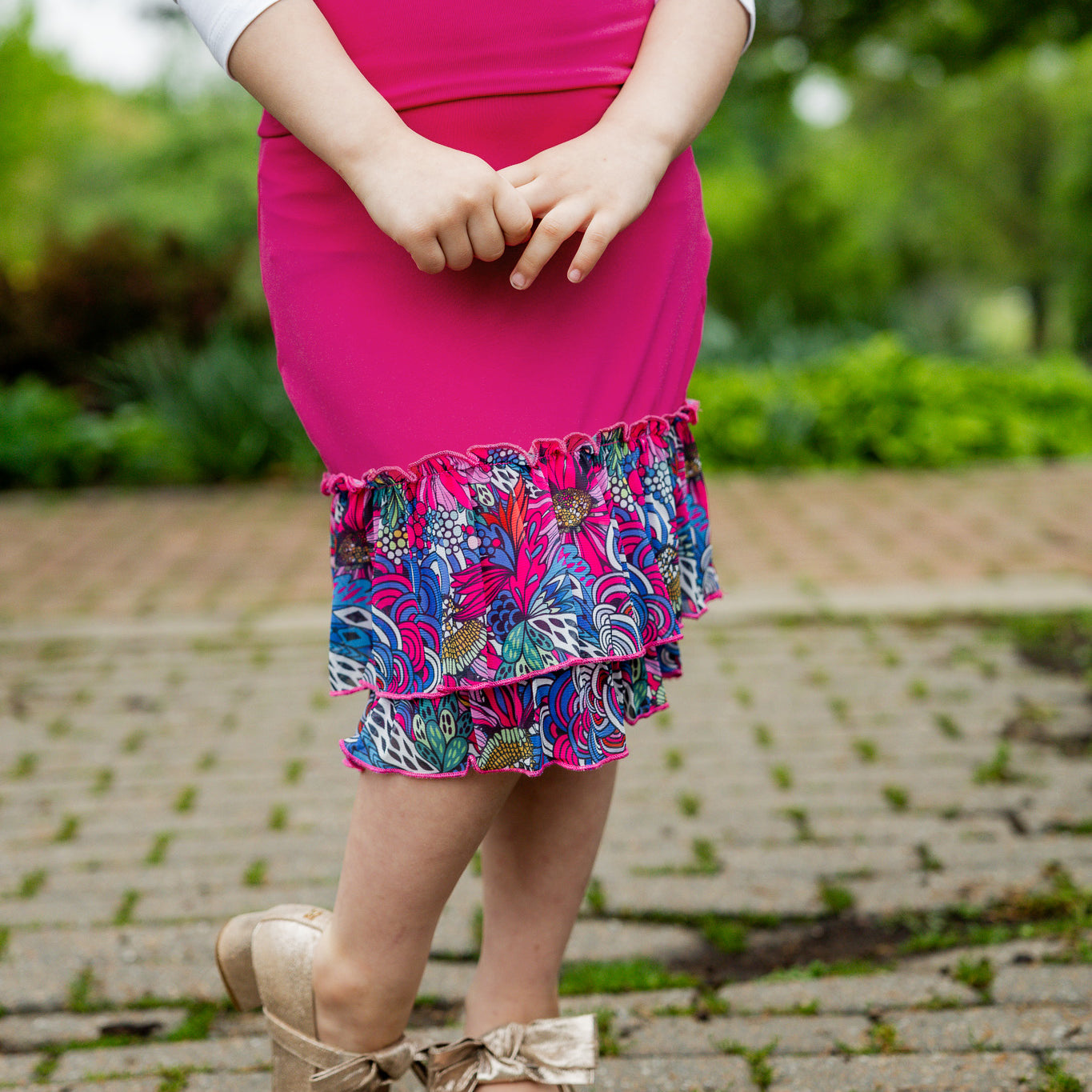 Modest girls’ ruffle slip with wide no-elastic waistband, perfect for layering under dresses and skirts.