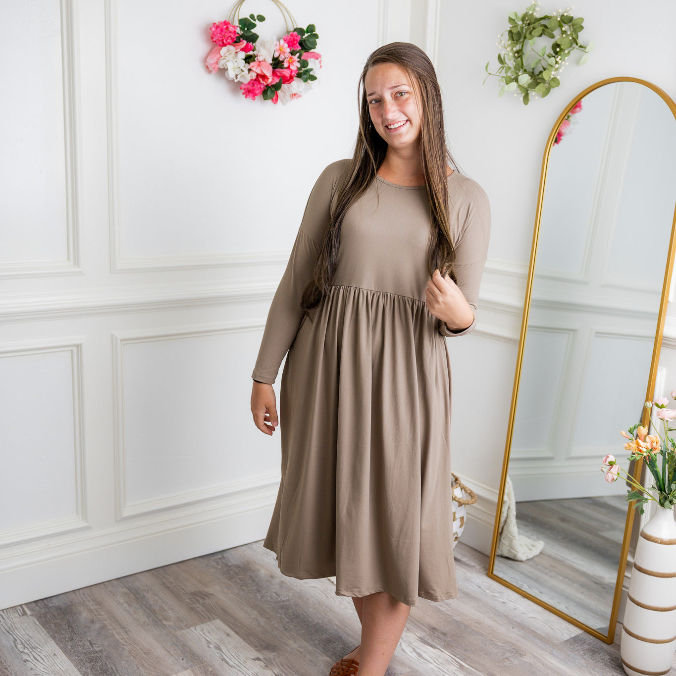 Nuggles® Farah Dress in solid color, modest long sleeve midi dress with empire waist, styled with flats for everyday wear.