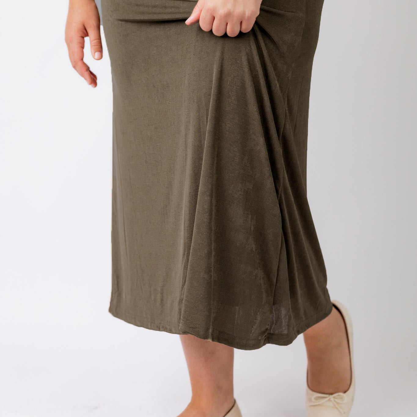 Nuggles® Renee Slinky Skirt – modest midi skirt in soft slinky stretch fabric, styled for everyday and dressy wear.