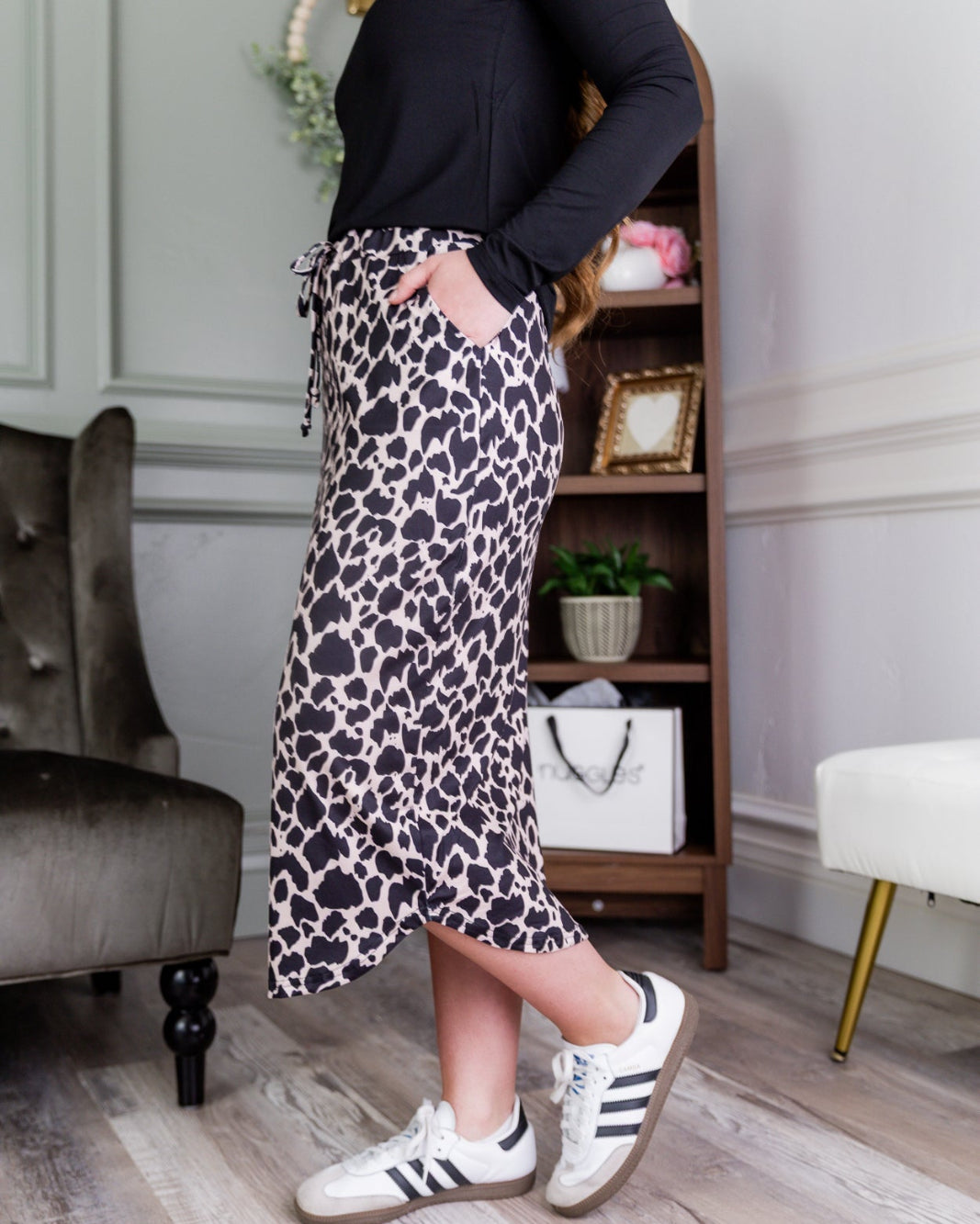 Model wearing Nuggles®31" Drawstring Skirt in Chic Leopard