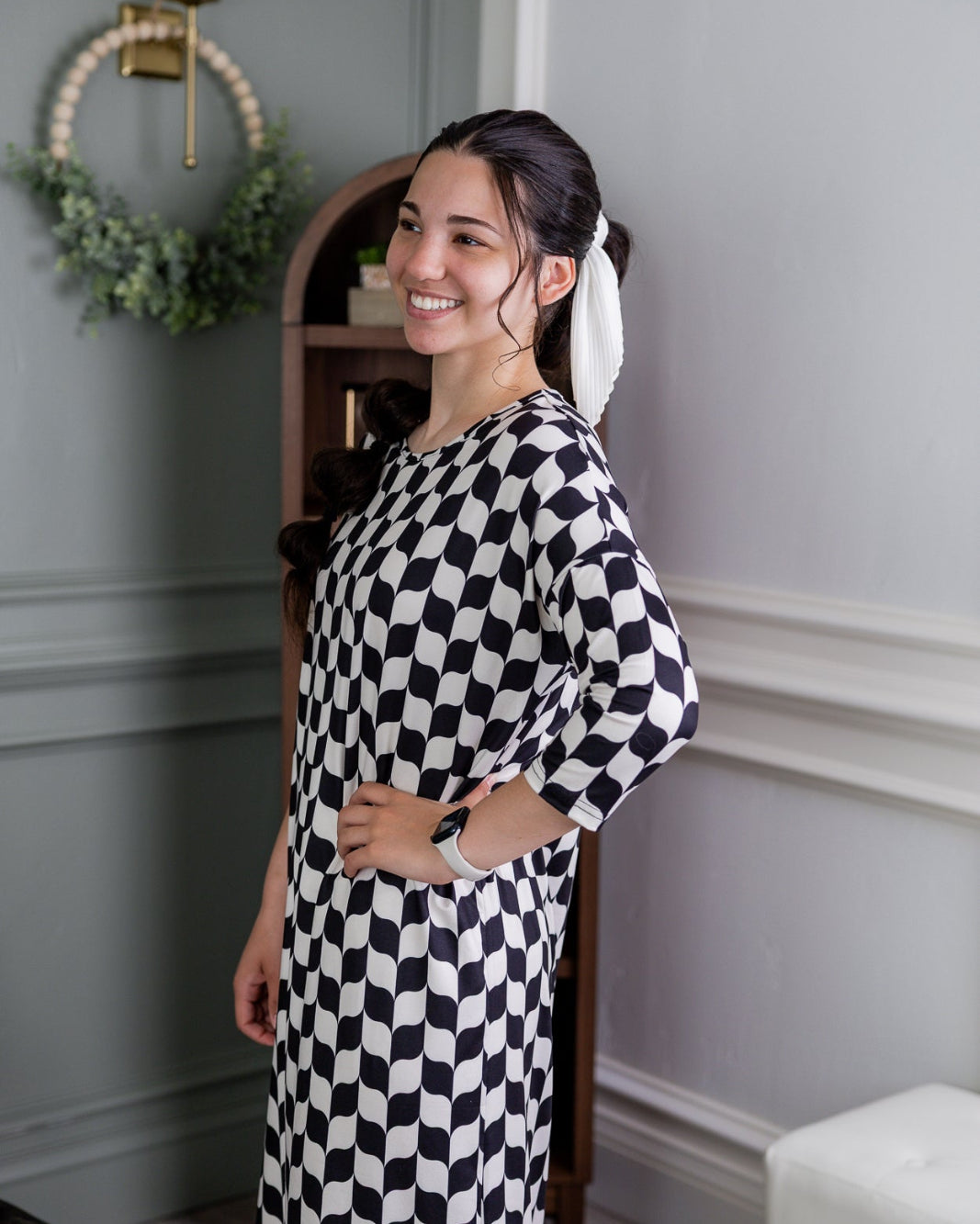 Model wearing Nuggles® Heather Dress in Wavy Checkerboard