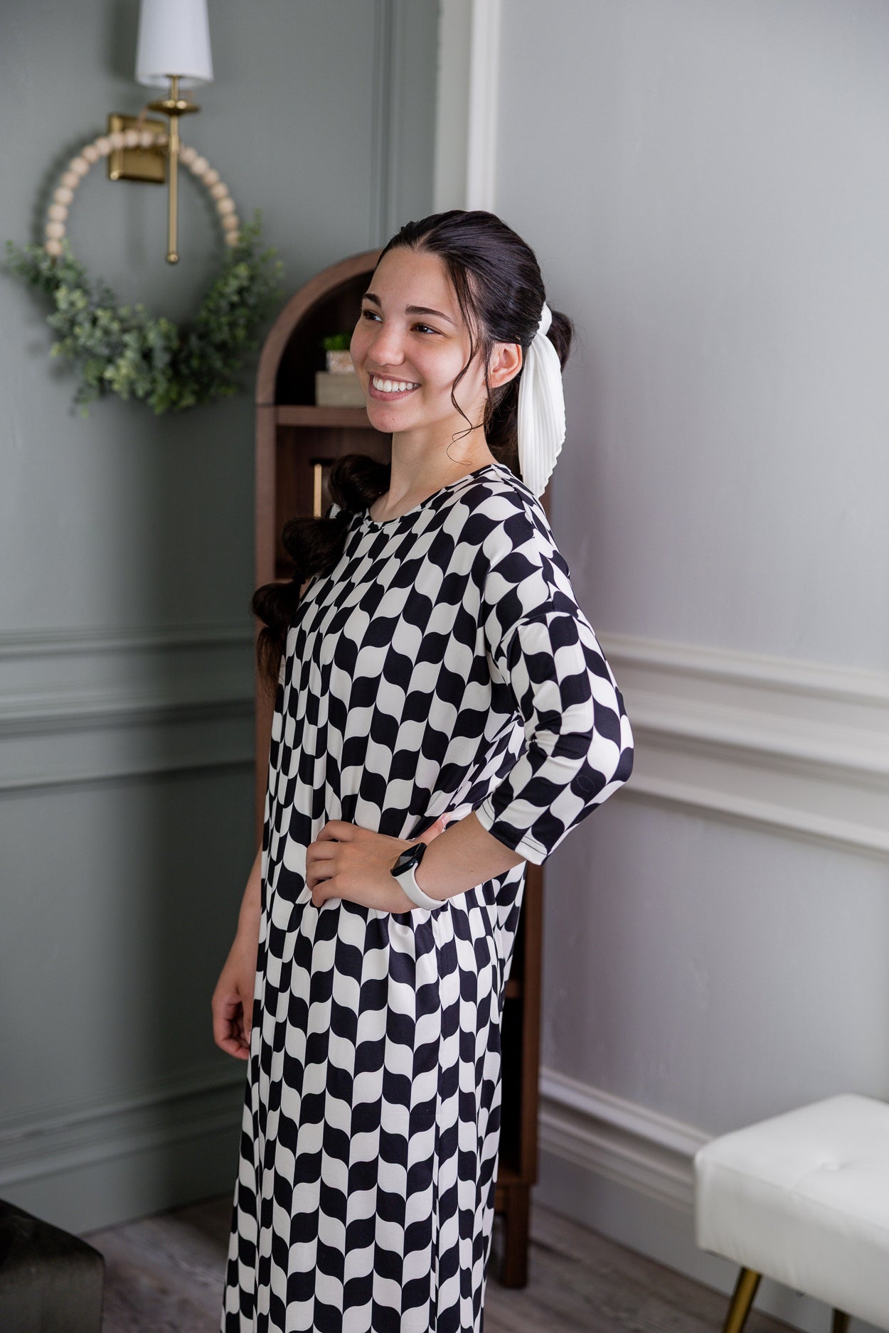 Model wearing Nuggles® Heather Dress in Wavy Checkerboard