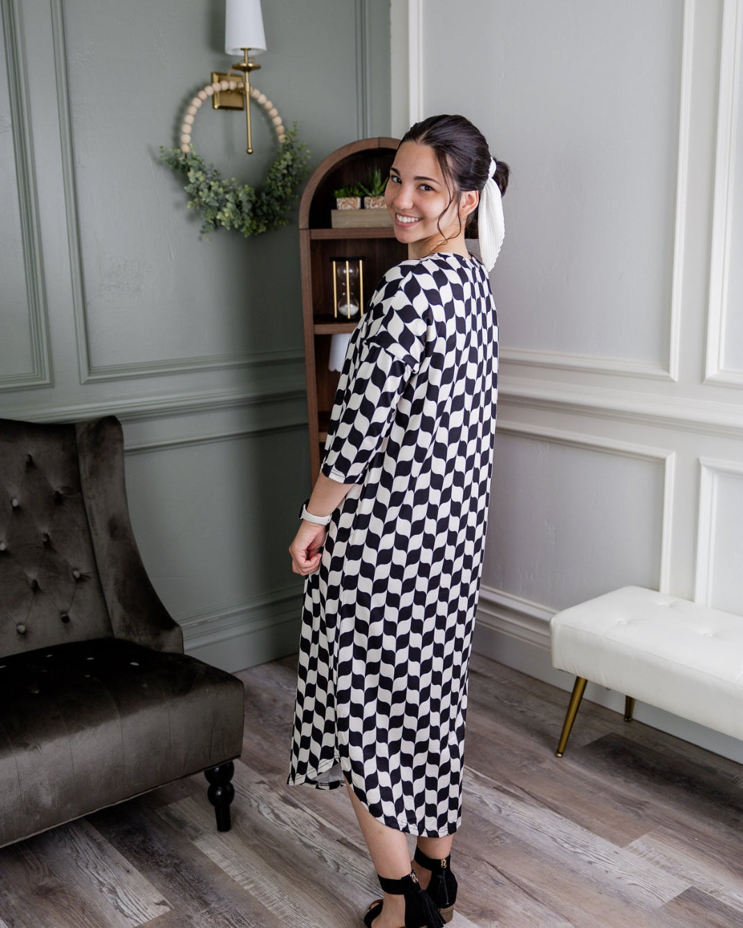 Model wearing Nuggles® Heather Dress in Wavy Checkerboard