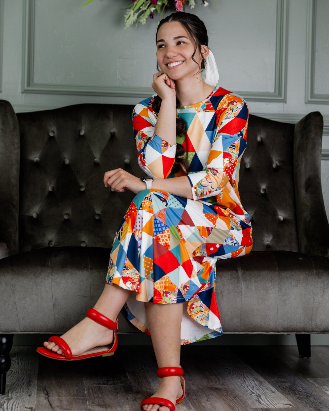 Model wearing Nuggles® Heather Dress in Triangle Taffy