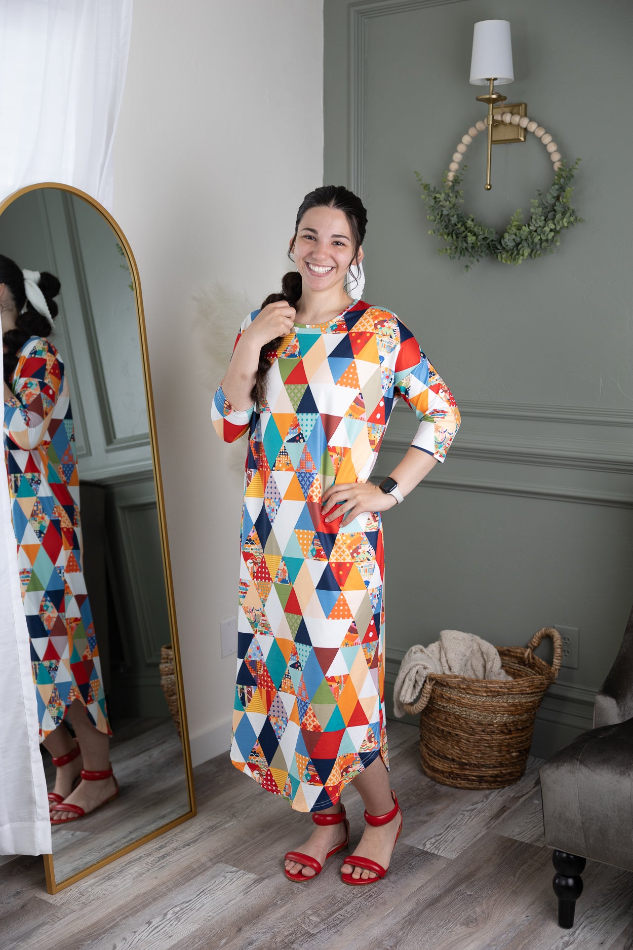 Model wearing Nuggles® Heather Dress in Triangle Taffy