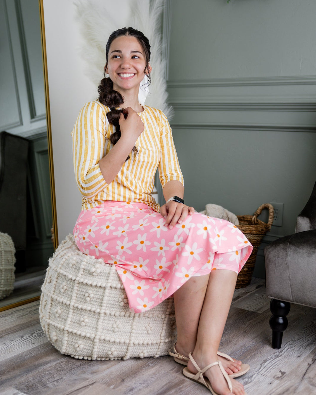 Model wearing Nuggles® 27" All-Sport Skirt in Pink Daisy Meadow