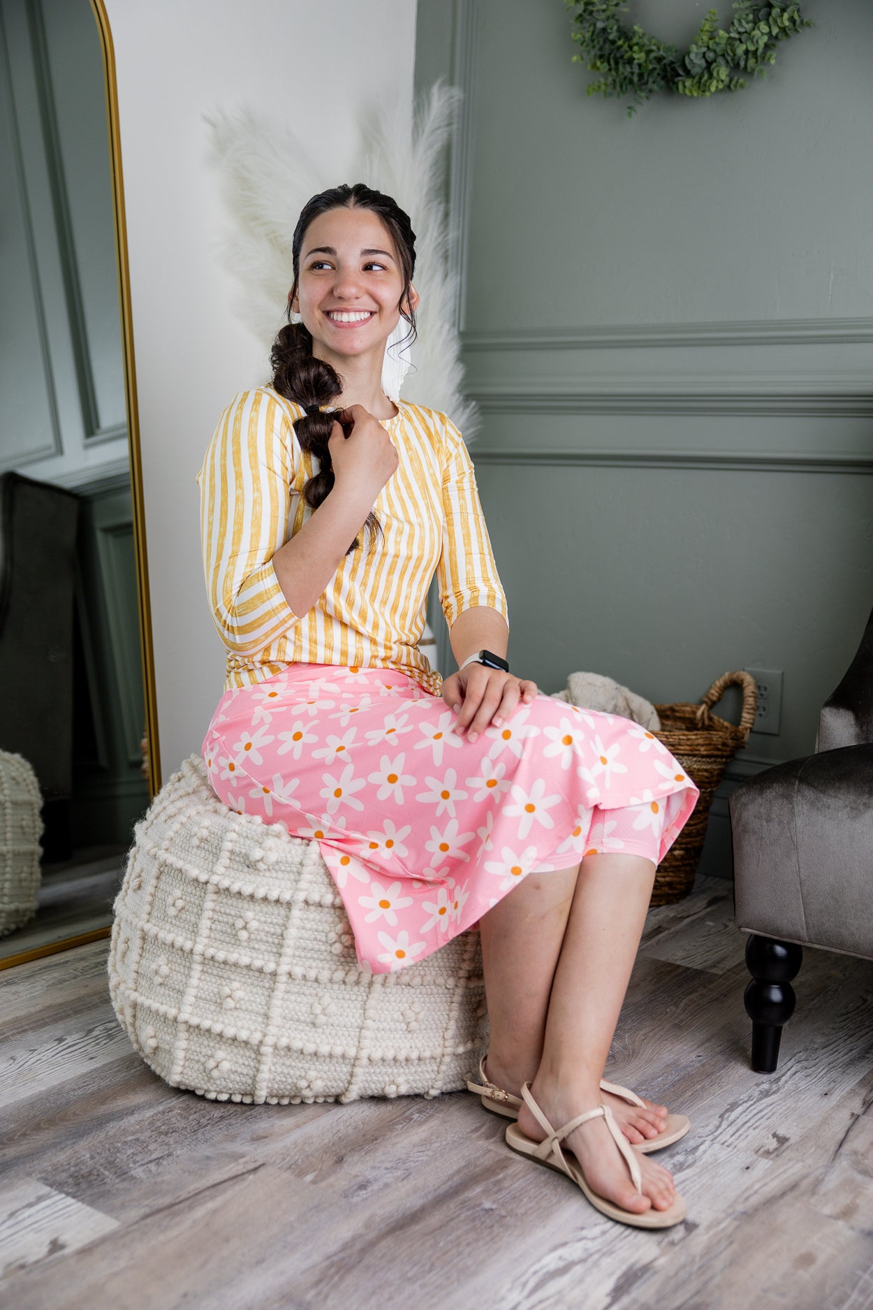 Model wearing Nuggles® 27" Sport Skirt in Pink Daisy Meadow