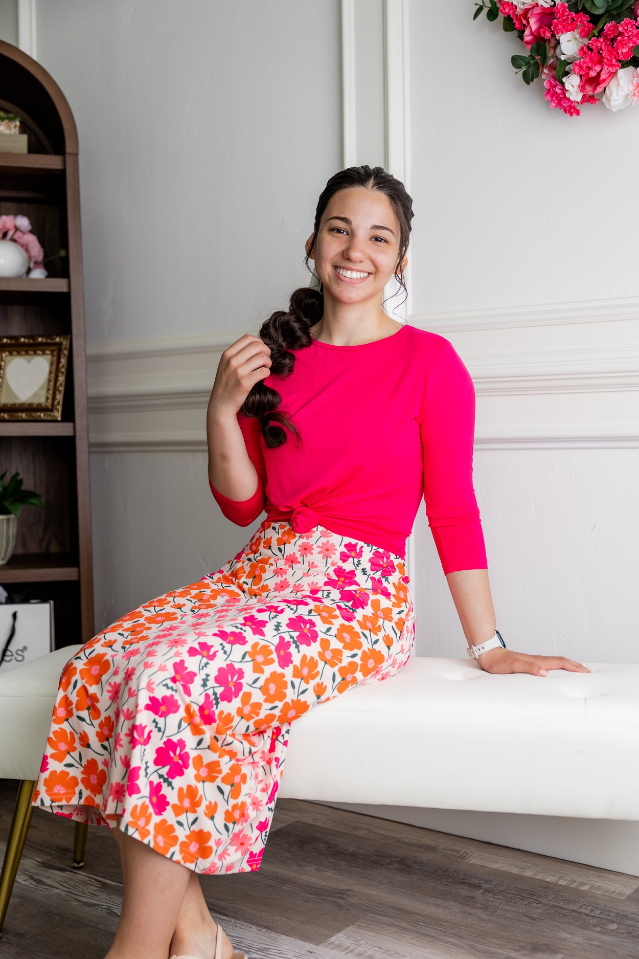 Model wearing Nuggles® 31" Sport Skirt in Sunset Garden