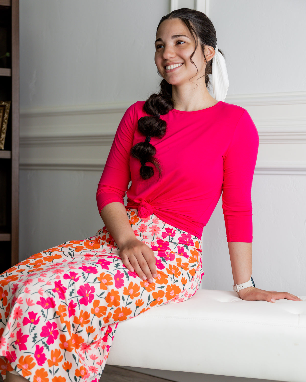 Model wearing Nuggles® 31" All-Sport Skirt in Meadow Sunset Garden