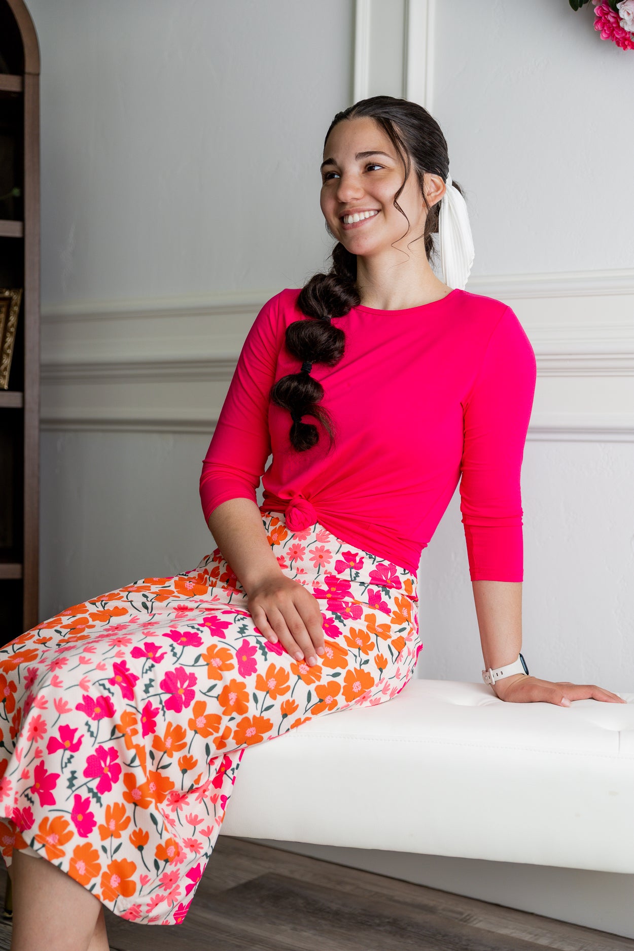 Model wearing Nuggles® 31" Sport Skirt in Sunset Garden