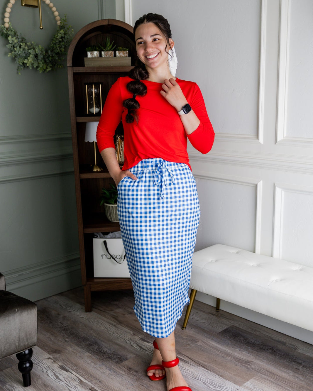 Model wearing Nuggles®31" Drawstring Skirt in Sky Gingham