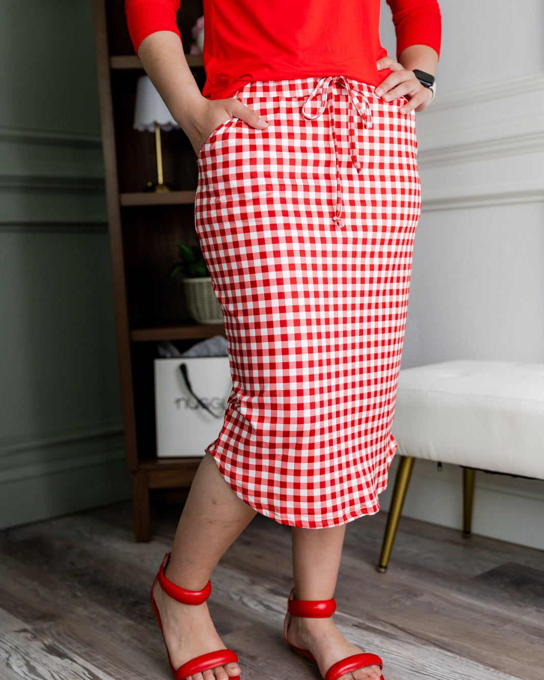 Model wearing Nuggles® 27" Drawstring Skirt in Cherry Jam