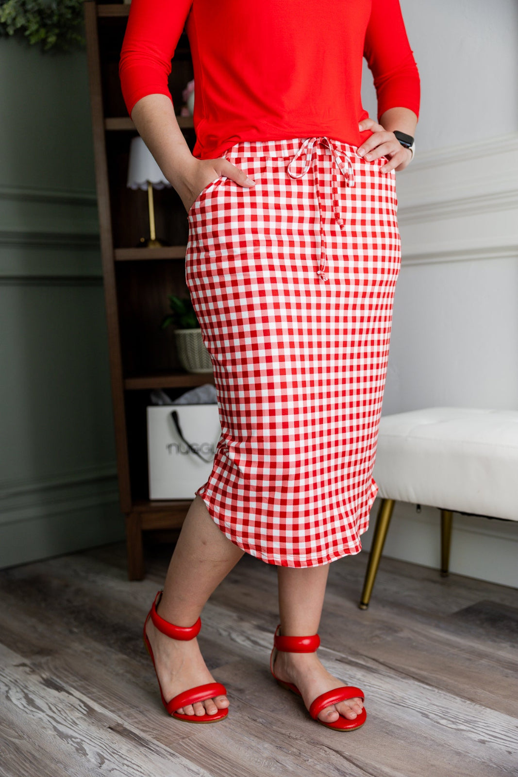 Model wearing Nuggles® 27" Drawstring Skirt in Cherry Jam