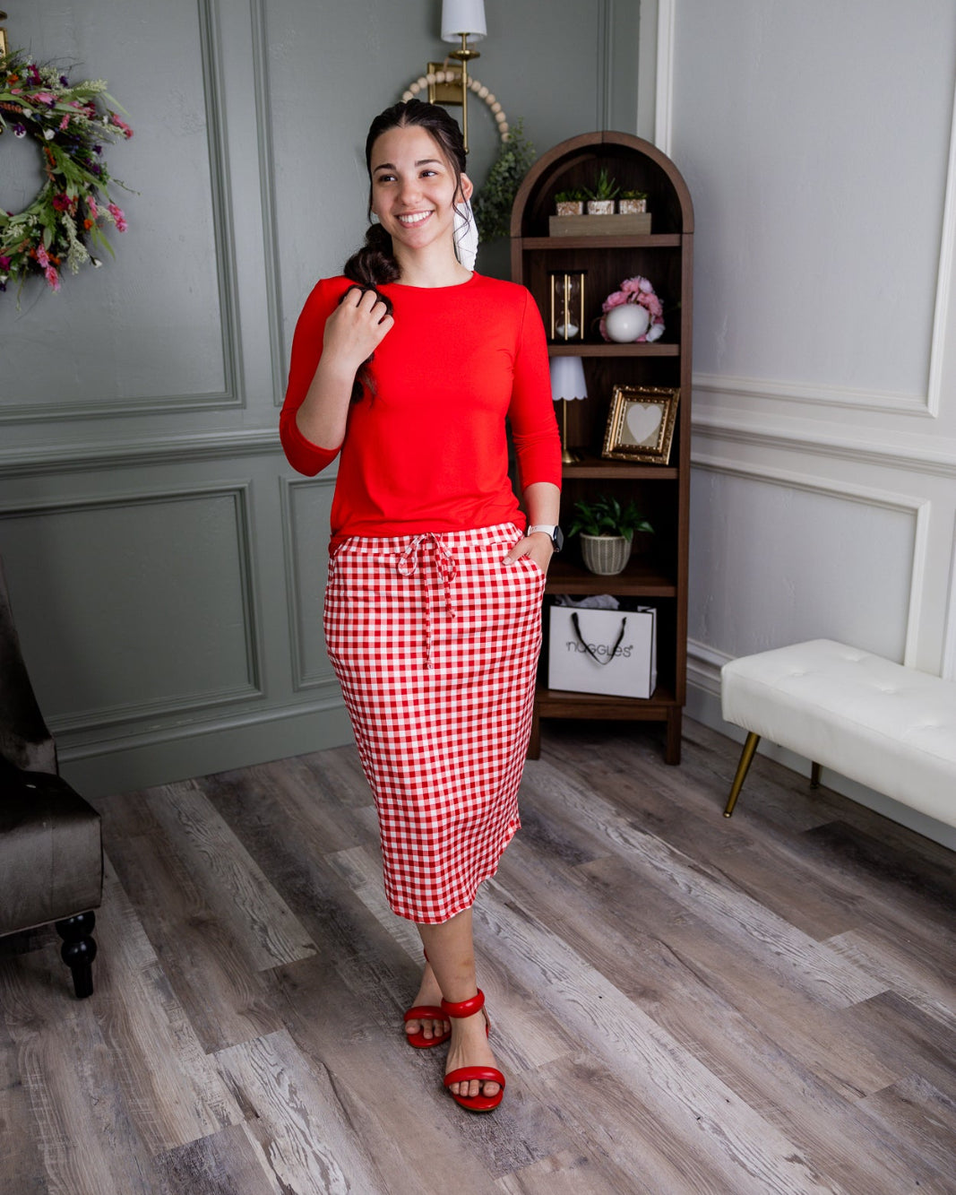 Model wearing Nuggles® 27" Drawstring Skirt in Cherry Jam