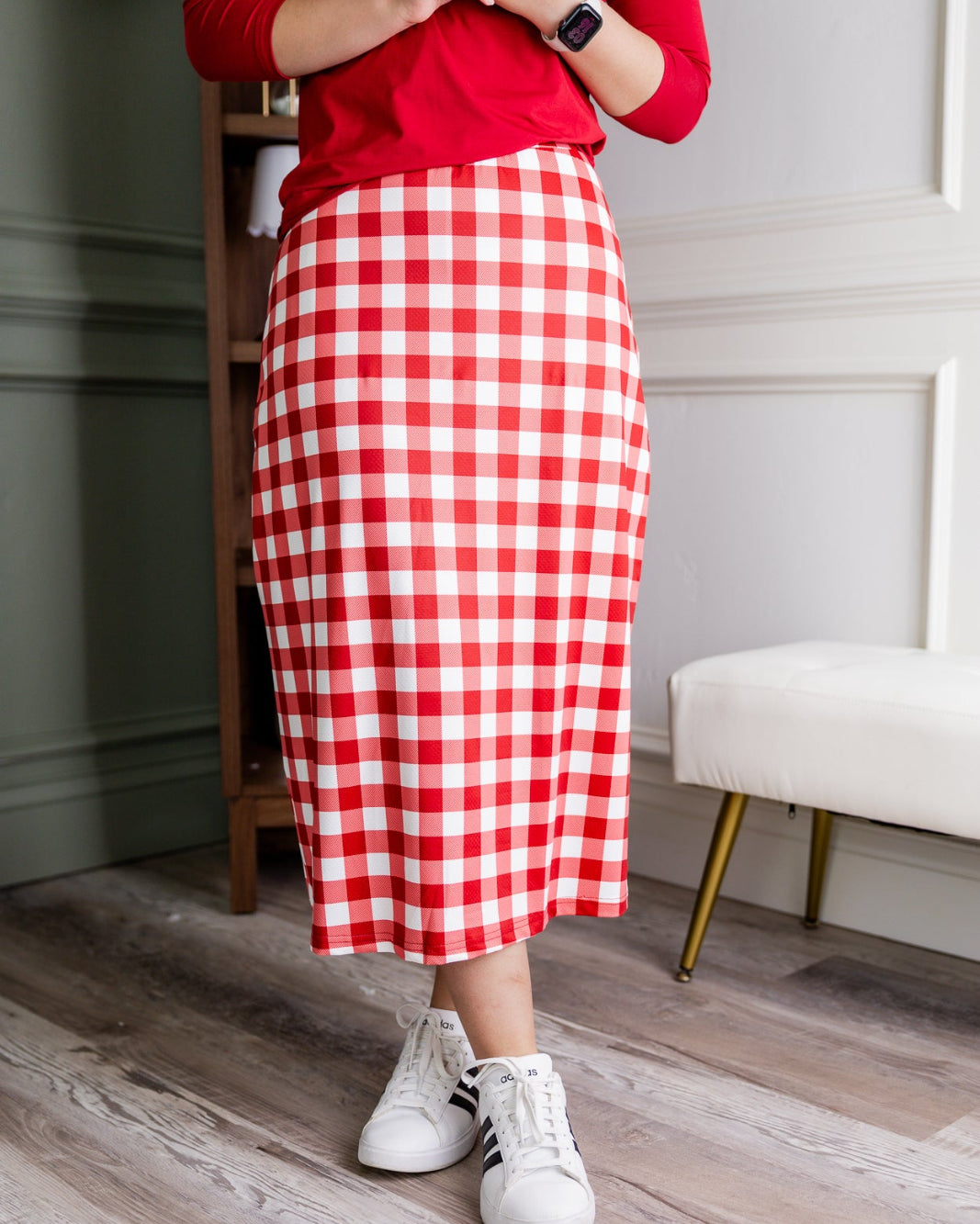 Model wearing Nuggles® 31" All-Sport Skirt in Cherry Jam