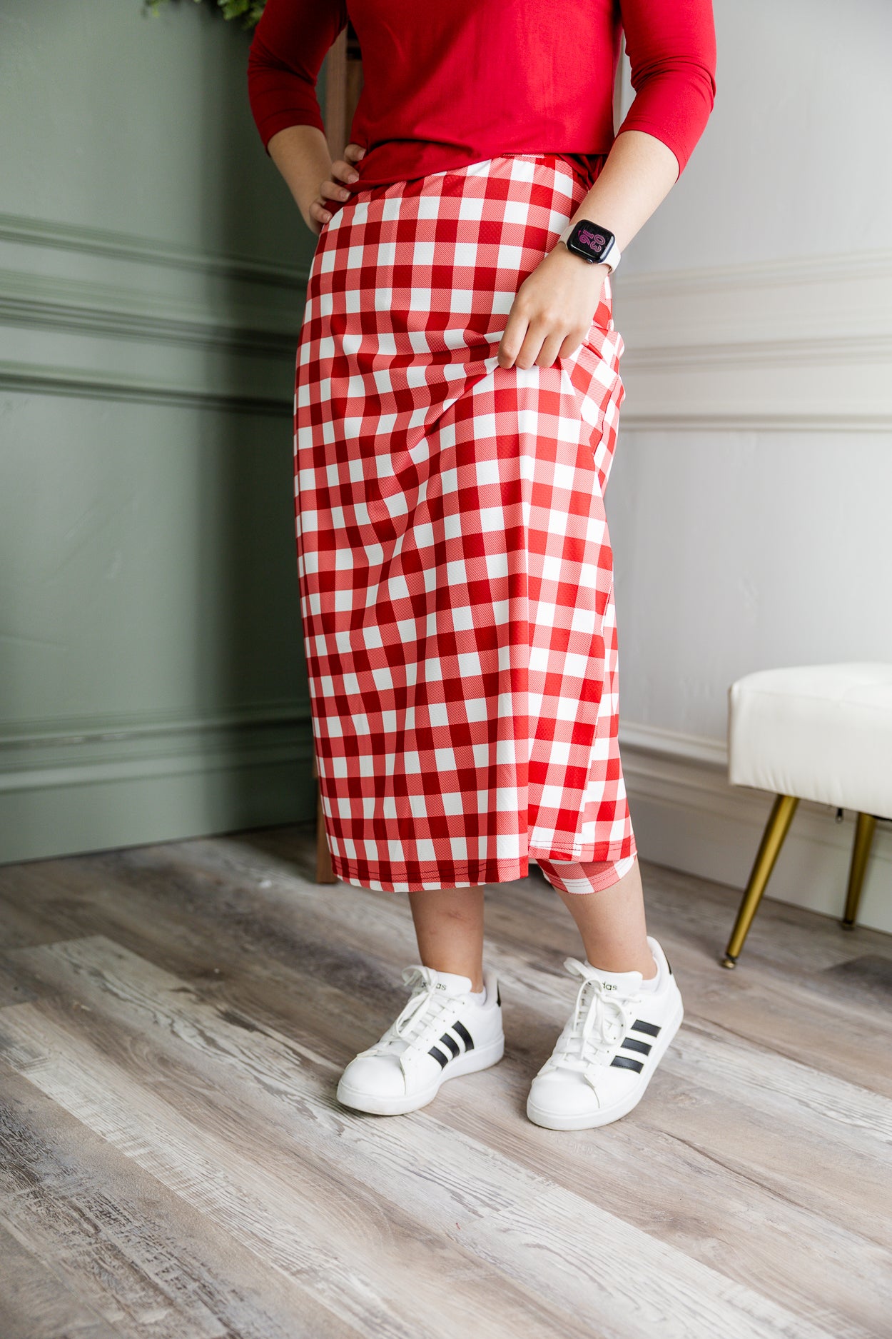 Model wearing Nuggles® 31" All-Sport Skirt in Cherry Jam