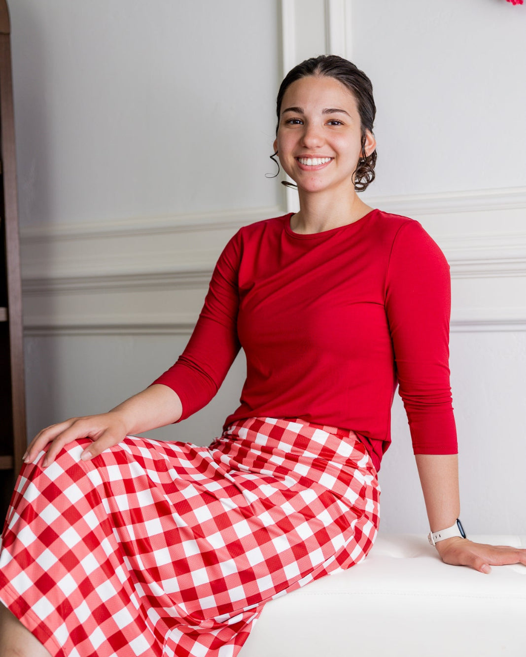 Model wearing Nuggles® 31" All-Sport Skirt in Cherry Jam