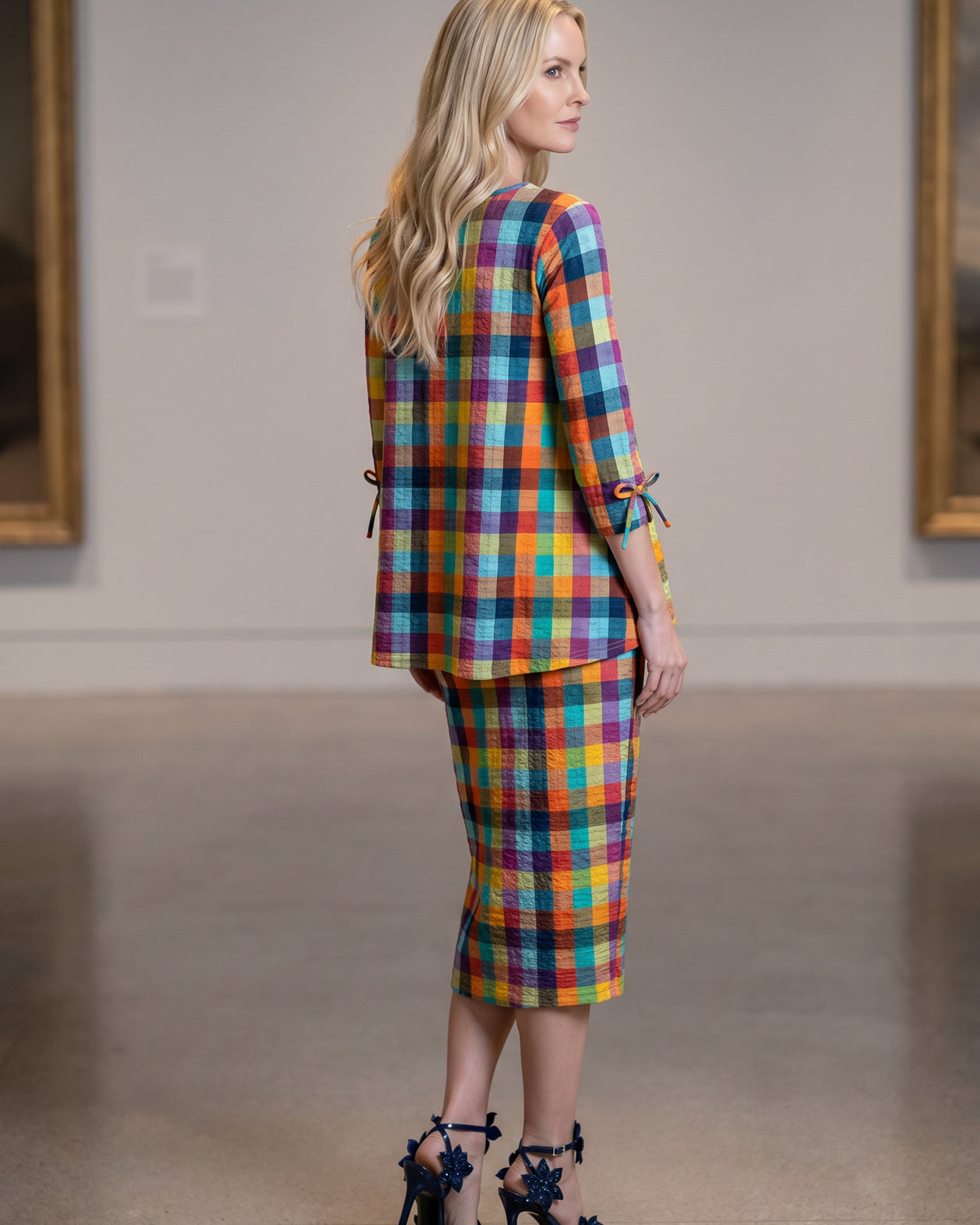 Model wearing Nuggles® Lexi Bow Top in Jackson Plaid