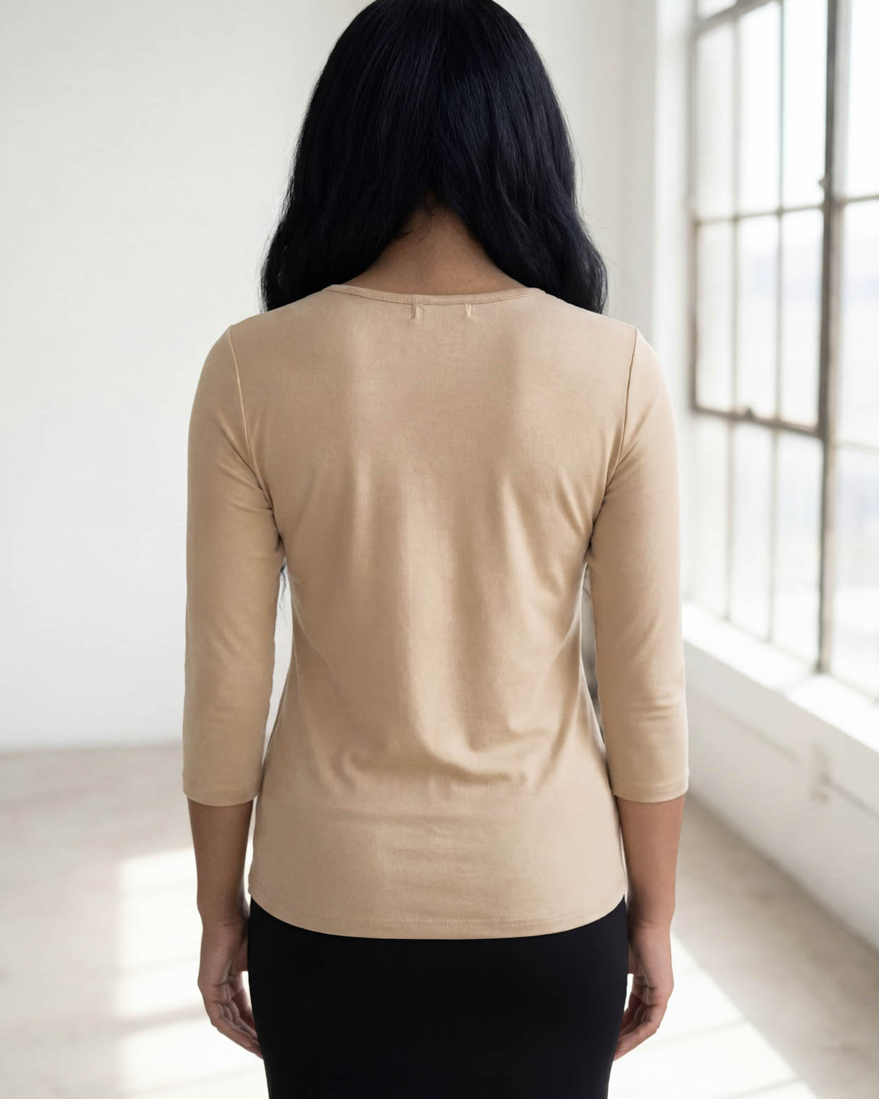 Model wearing Nuggles® 3/4 Essential Tee in Khaki