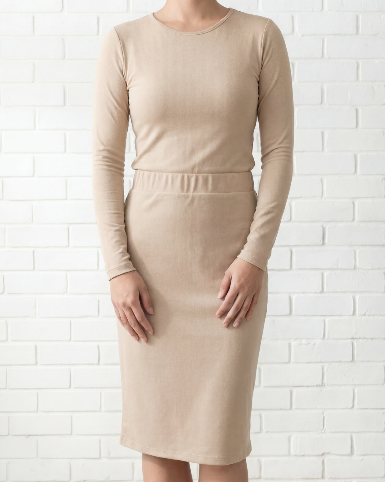 Model wearing Nuggles® 25" Relaxed Midi Skirt in Khaki