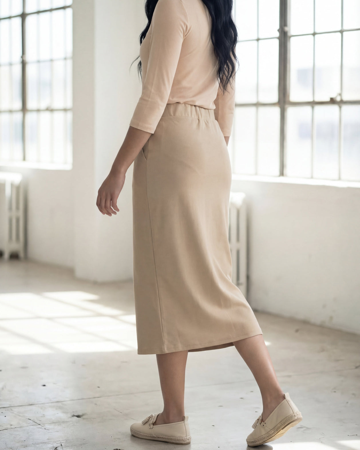 Model wearing Nuggles® 31" Pocket Classic Skirt in Khaki