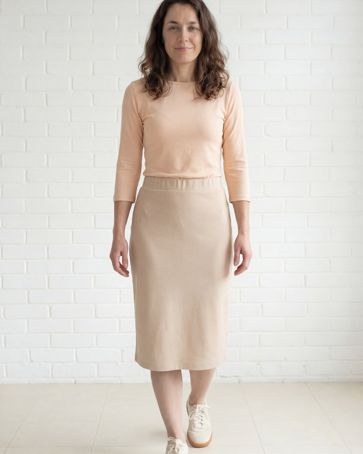 Model wearing Nuggles® 27" Relaxed Midi Skirt in Khaki