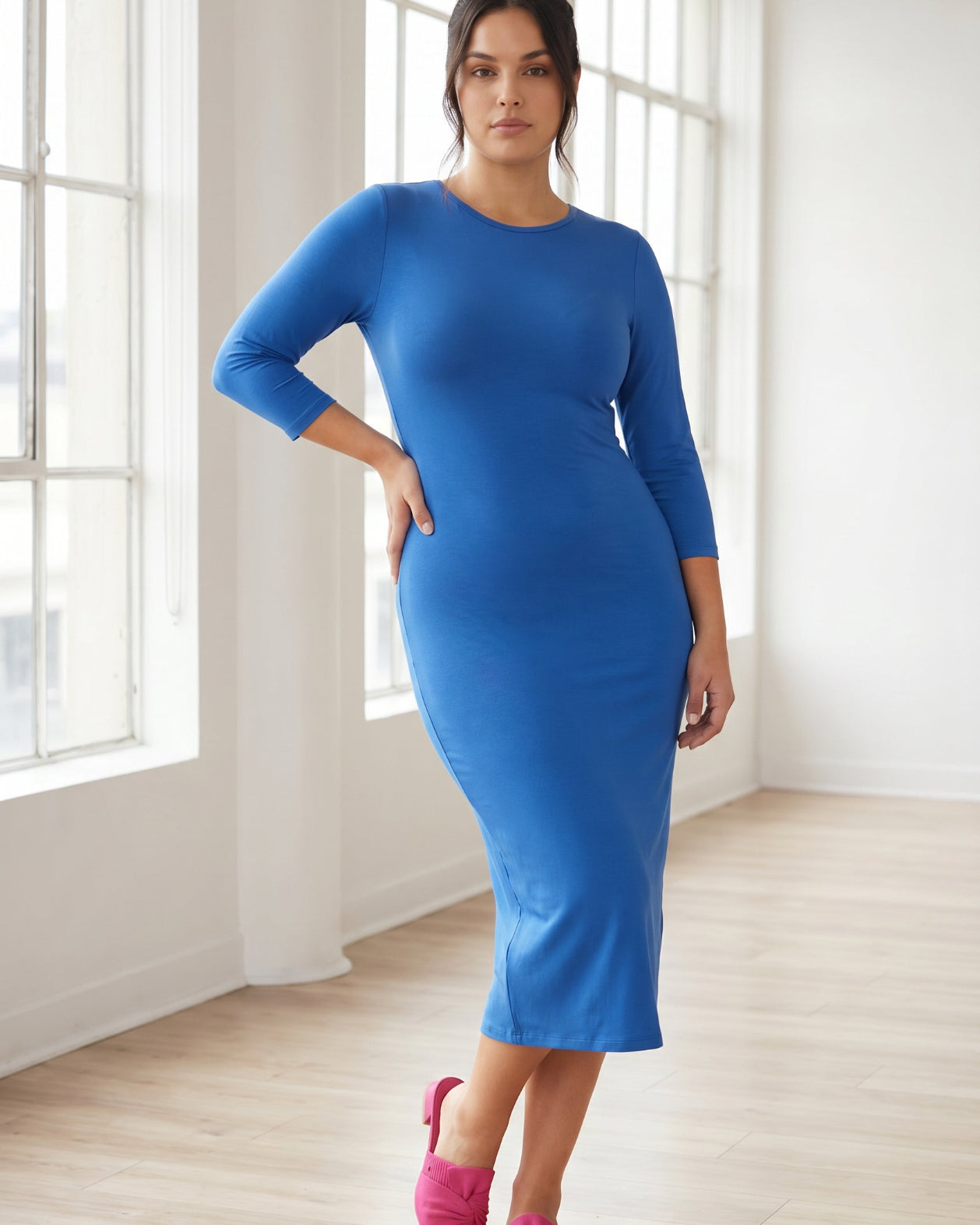 Model wearing Nuggles® Midi Layering Dress in Lapiz Blue