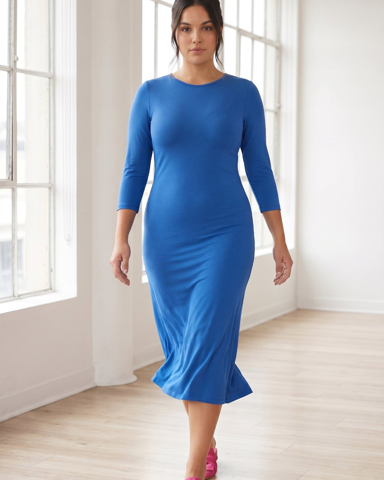 Model wearing Nuggles® Midi Layering Dress in Lapiz Blue