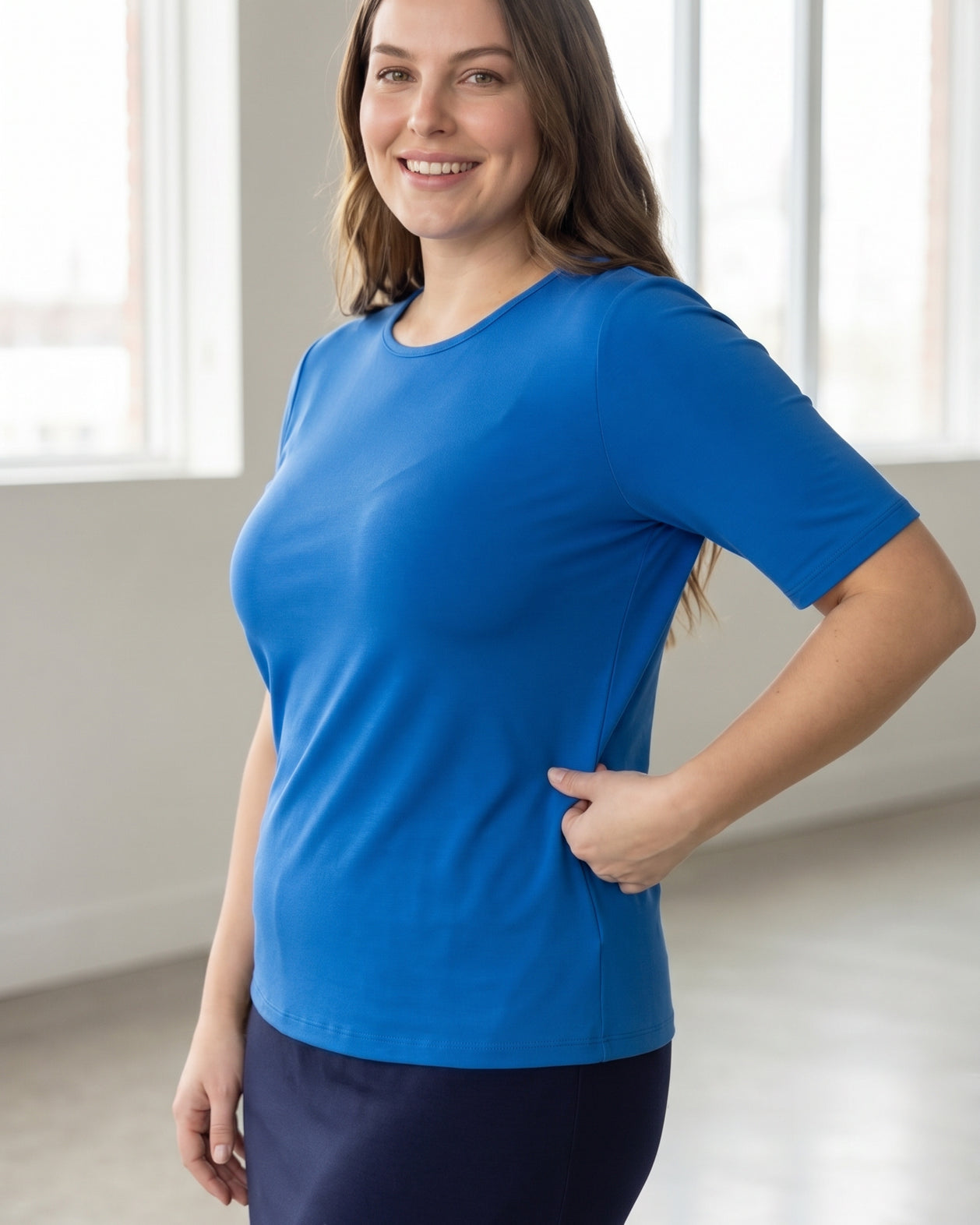 Model wearing the Nuggles® Essential Half Sleeve Tee in Lapiz Blue