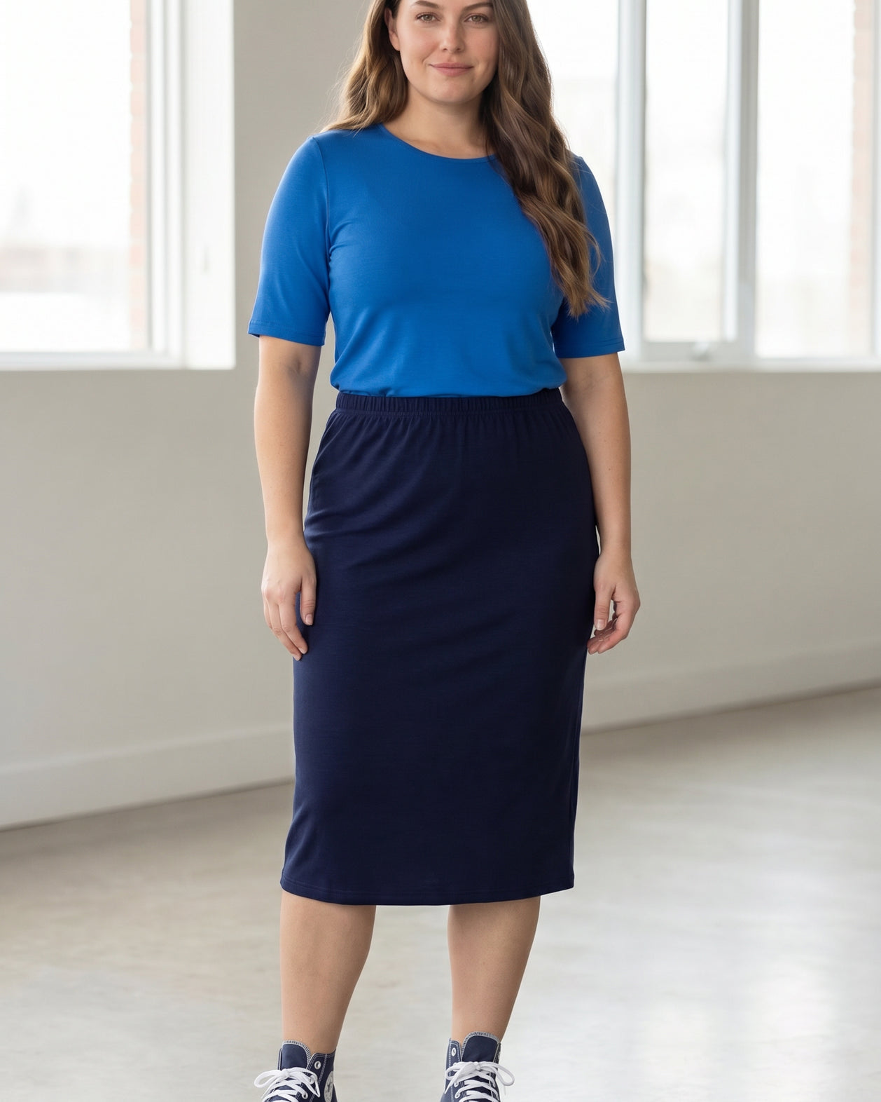 Model wearing the Nuggles® Essential Half Sleeve Tee in Lapiz Blue