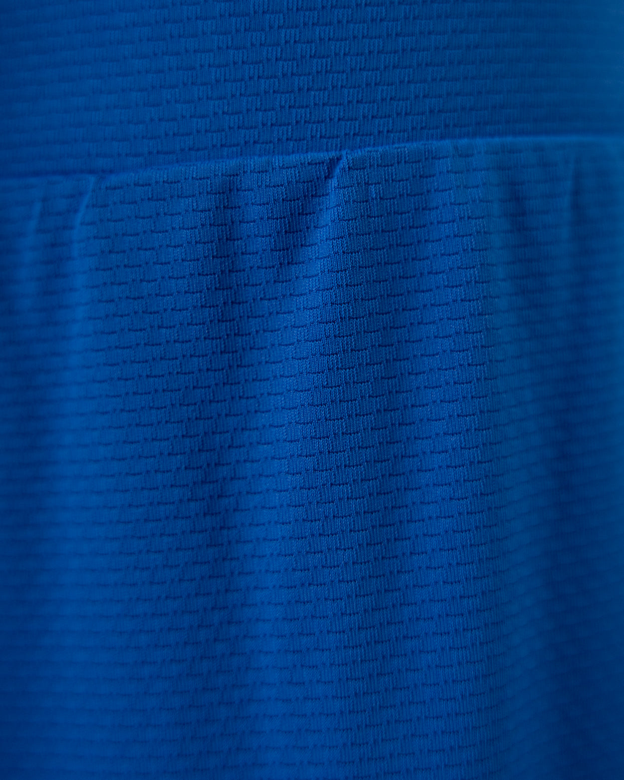 Model wearing Nuggles® Girls All-Sport Skirt in Lapiz Blue