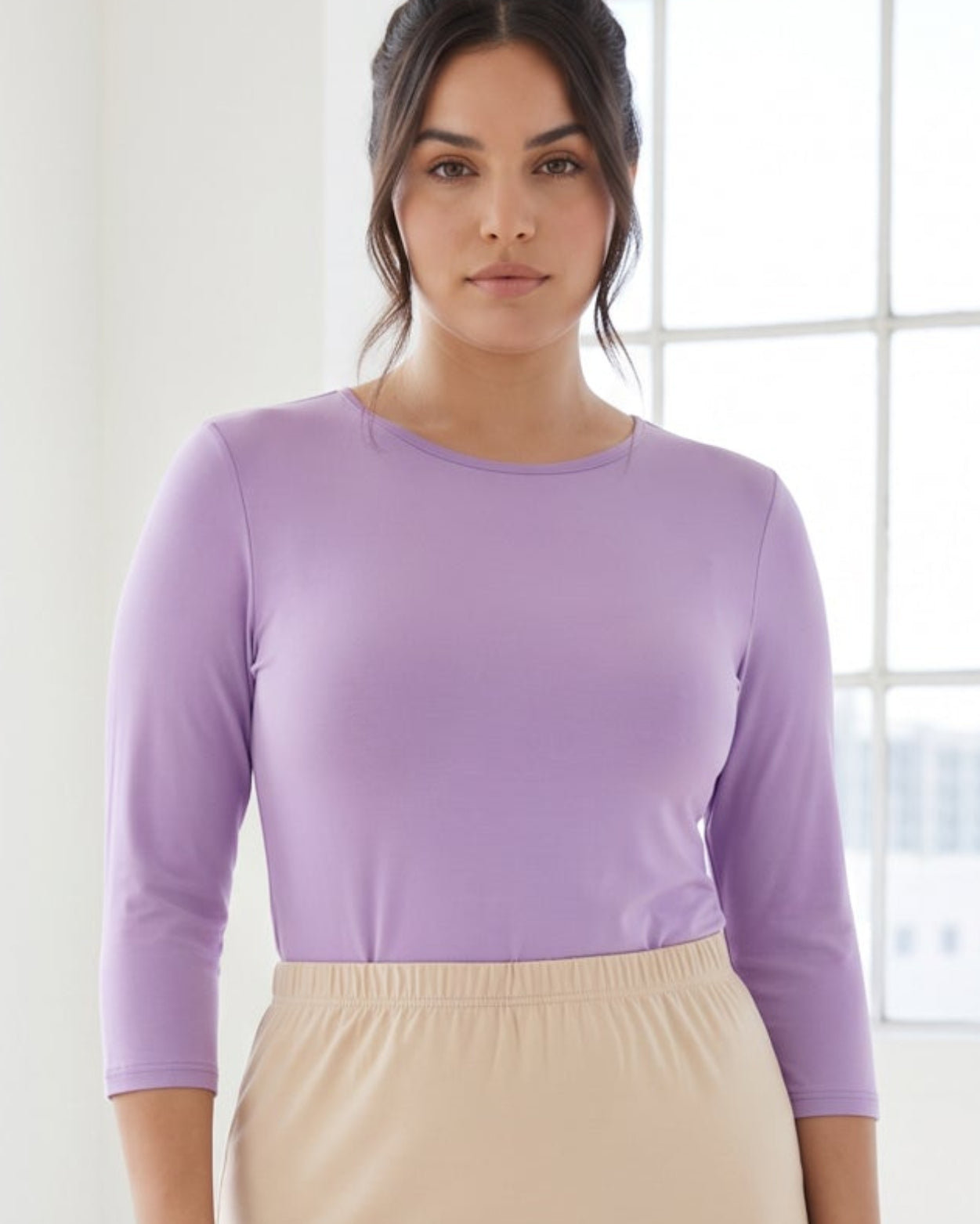 Model wearing Nuggles® 3/4 Essential Tee in Lavender