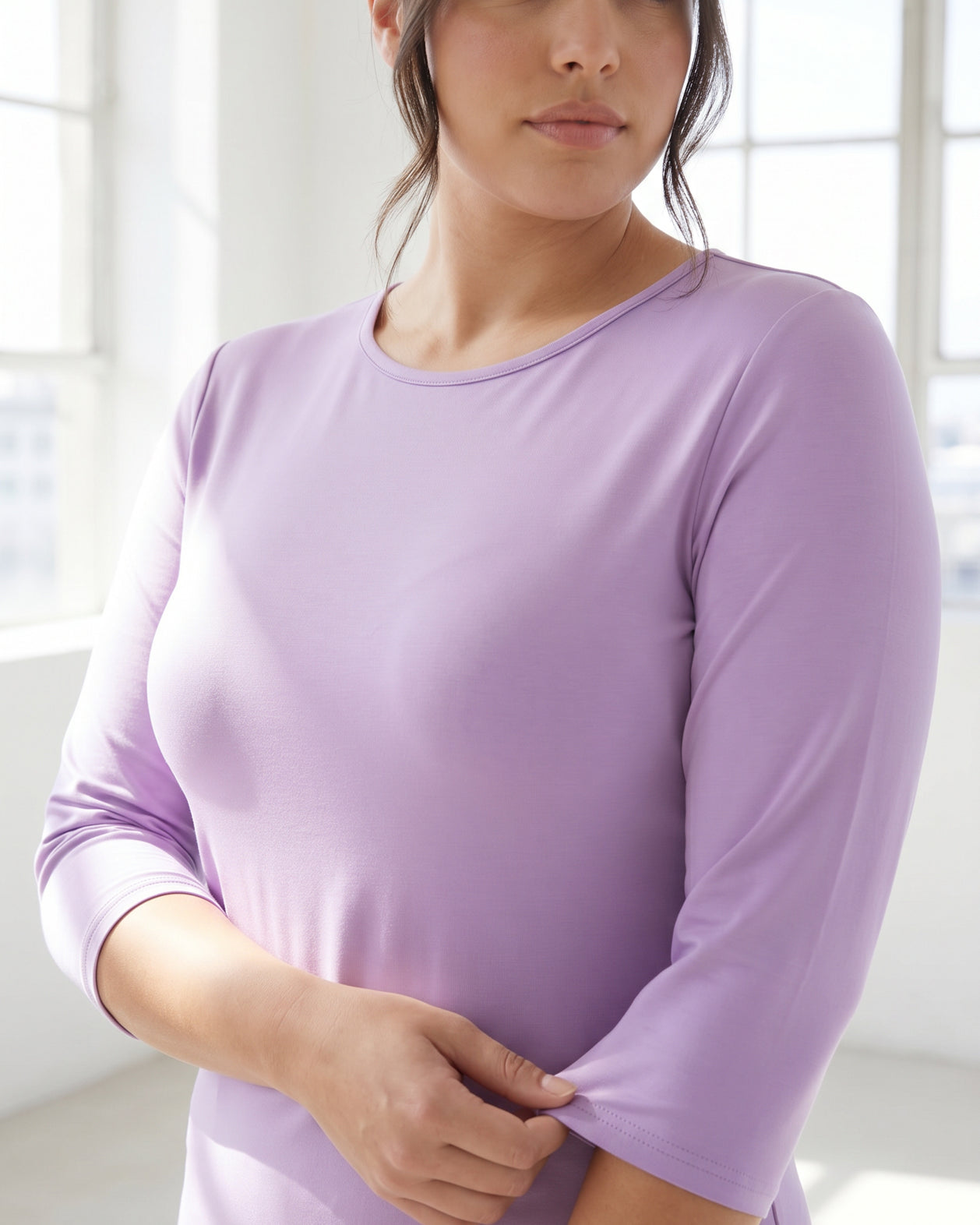 Model wearing Nuggles® 3/4 Essential Tee in Lavender